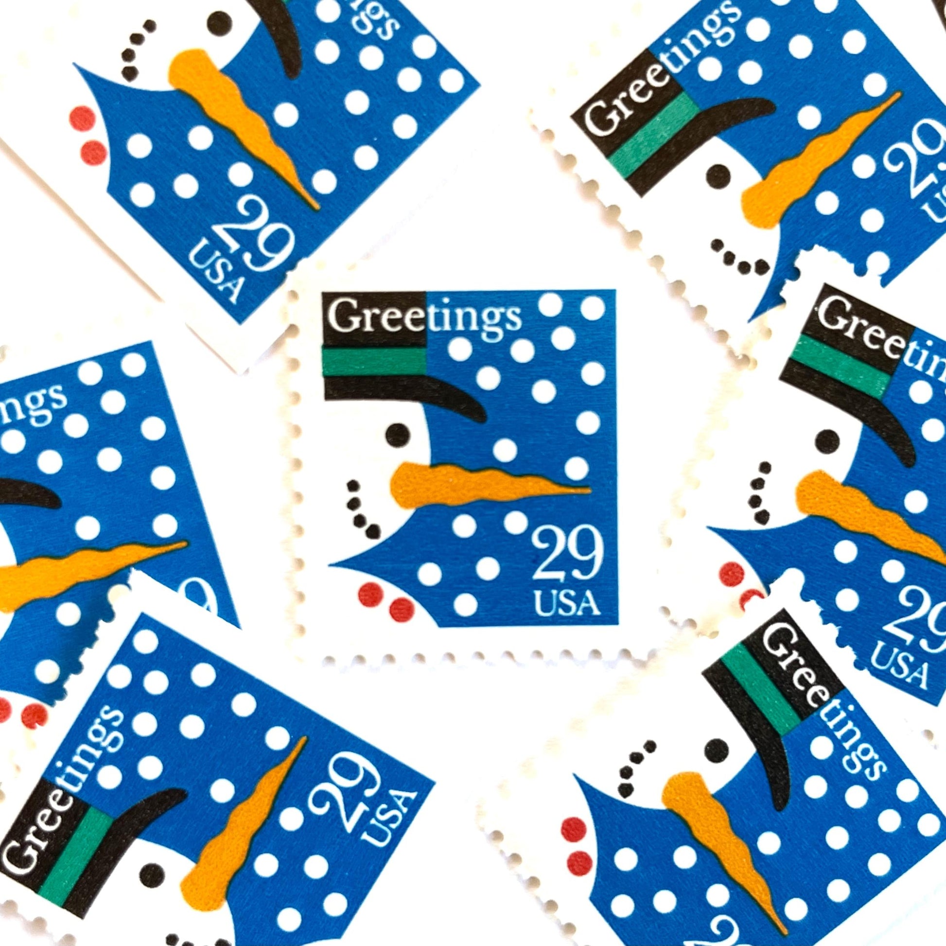 Image of 1993 Contemporary Christmas “Snowman” 29-cent stamps. Scott #2796. Stamp Themes: Snowman, Snow, Snowing, Holidays, Greetings. Blue, white postage stamp.