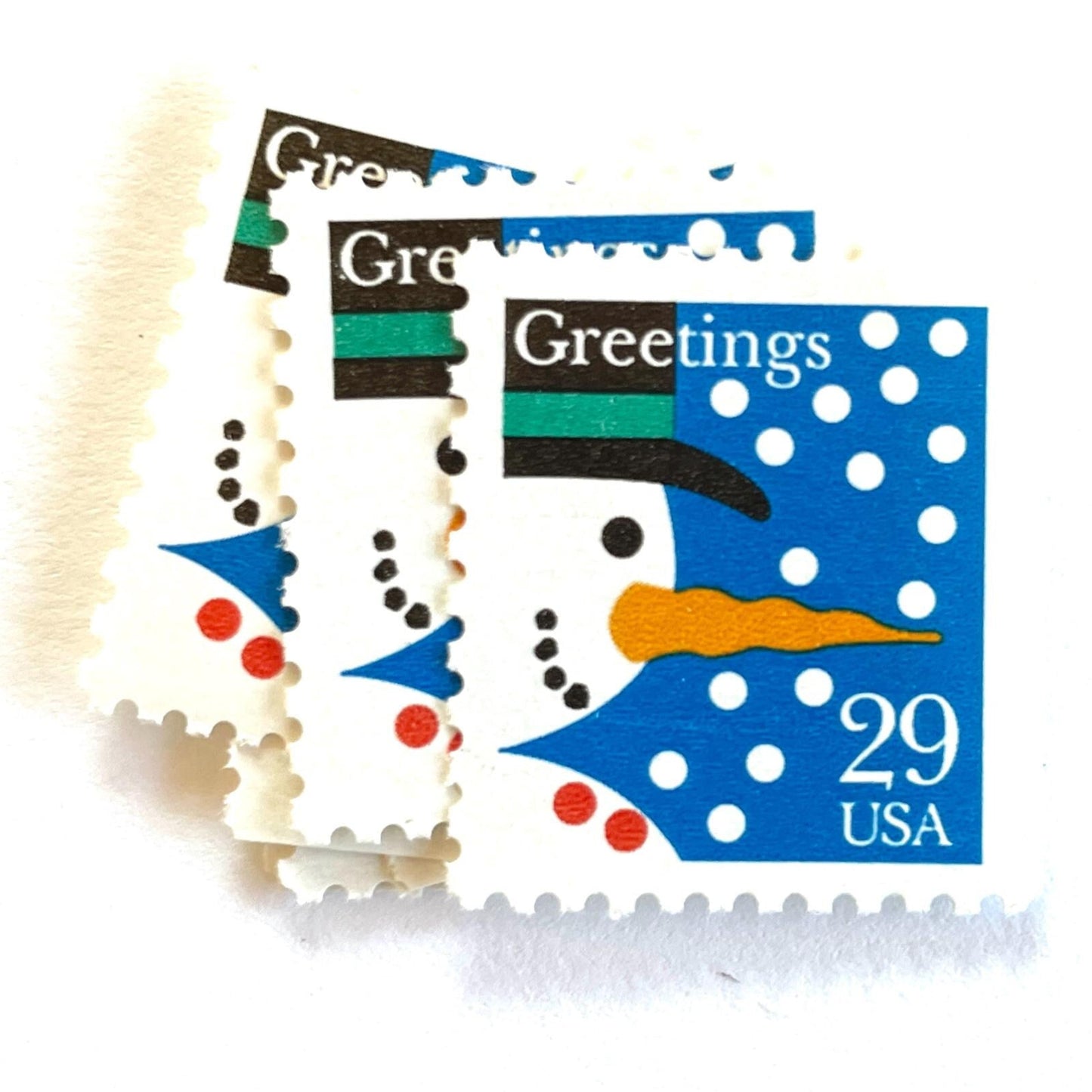Image of 1993 Contemporary Christmas “Snowman” 29-cent stamps. Scott #2796. Stamp Themes: Snowman, Snow, Snowing, Holidays, Greetings. Blue, white postage stamp.