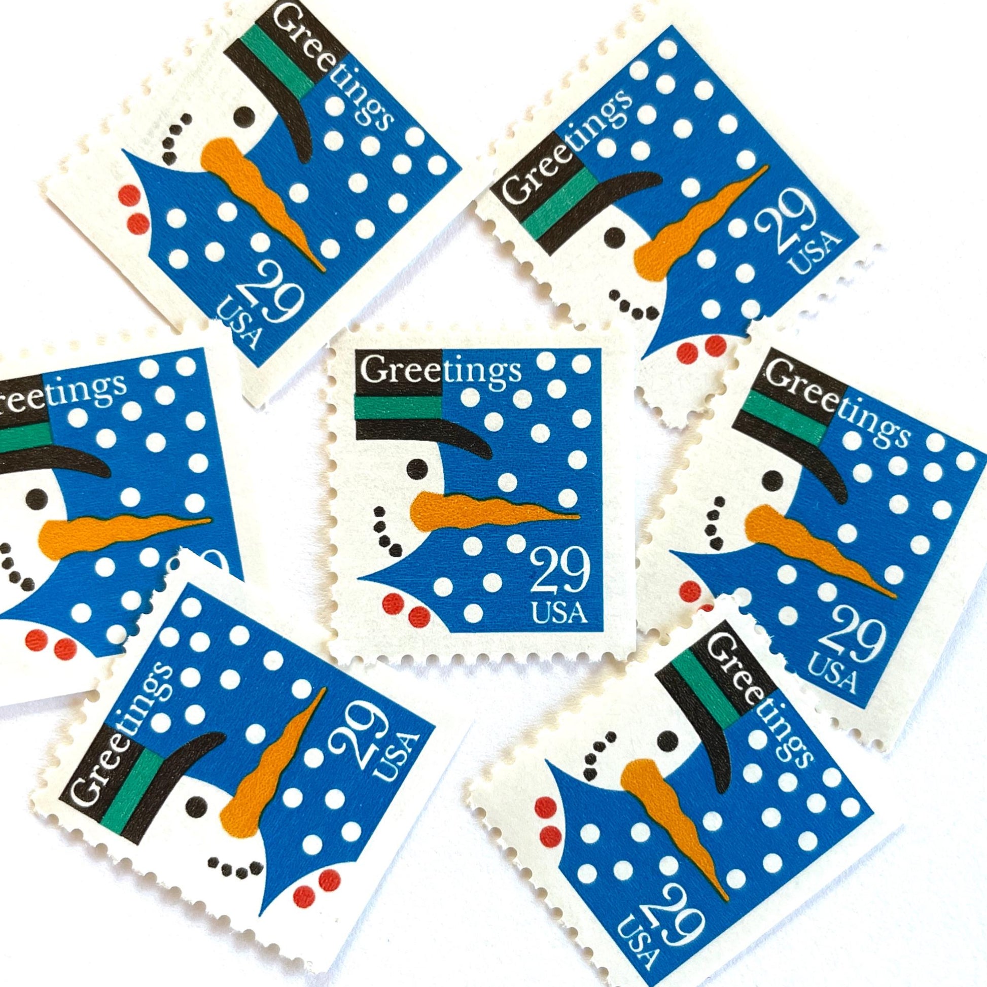 Image of 1993 Contemporary Christmas “Snowman” 29-cent stamps. Scott #2796. Stamp Themes: Snowman, Snow, Snowing, Holidays, Greetings. Blue, white postage stamp.