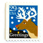 Image of 1993 Contemporary Christmas “Christmas Greetings: Reindeer” 29-cent stamps. Scott #2797. Stamp Themes: Rudolf the Red Nosed Reindeer, Deer, Antlers, Snow, Winter, Christmas, Holidays. Blue, Brown, and White postage stamp.