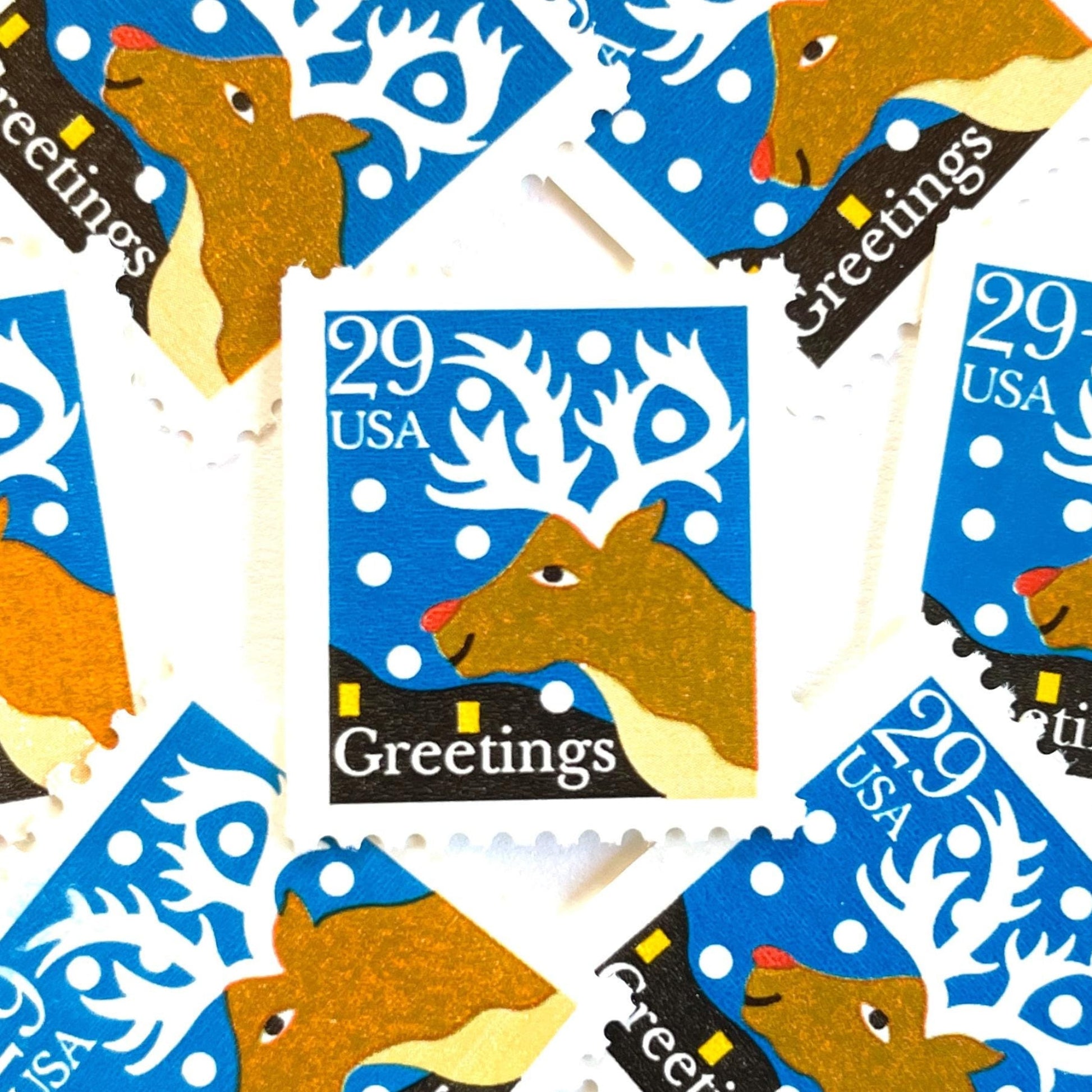 Image of 1993 Contemporary Christmas “Christmas Greetings: Reindeer” 29-cent stamps. Scott #2797. Stamp Themes: Rudolf the Red Nosed Reindeer, Deer, Antlers, Snow, Winter, Christmas, Holidays. Blue, Brown, and White postage stamp.