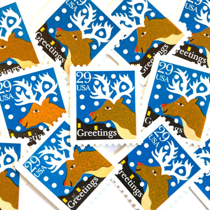 Image of 1993 Contemporary Christmas “Christmas Greetings: Reindeer” 29-cent stamps. Scott #2797. Stamp Themes: Rudolf the Red Nosed Reindeer, Deer, Antlers, Snow, Winter, Christmas, Holidays. Blue, Brown, and White postage stamp.