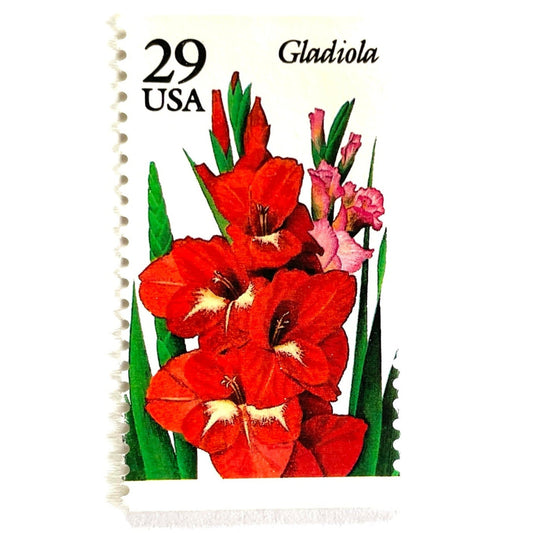 Image of Gladiola postage stamps from the 1994 Summer Garden Flowers series, featuring red-orange gladiola blossoms with green foliage on vintage unused 29-cent USPS postage, Scott 2831.