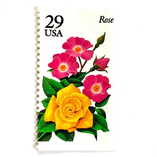 Image of Rose postage stamps from the 1994 Summer Garden Flowers series, featuring a yellow rose with pink blossoms and green foliage on vintage unused 29-cent USPS postage, Scott 2833