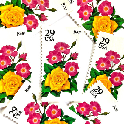 Image of Rose postage stamps from the 1994 Summer Garden Flowers series, featuring a yellow rose with pink blossoms and green foliage on vintage unused 29-cent USPS postage, Scott 2833.
