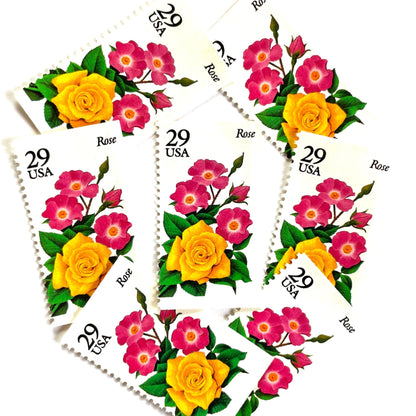 Image of Rose postage stamps from the 1994 Summer Garden Flowers series, featuring a yellow rose with pink blossoms and green foliage on vintage unused 29-cent USPS postage, Scott 2833