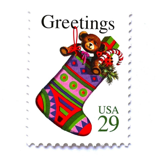 Image of 1994 Contemporary Christmas “Christmas Stocking” 29-cent stamps. Scott #2872. Stamp Themes: Christmas Stocking, Presents, Teddy Bear, Holidays, Greetings. Multicolored postage stamp.