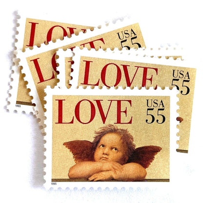Cherub postage stamps from 1995 featuring a winged cherub in classical romantic style on vintage unused 55-cent USPS postage, Scott 2958.