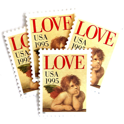 Cherub postage stamps from 1995 featuring Raphael’s contemplative cherub from the Sistine Madonna on vintage unused 32-cent USPS postage, Scott 2959.