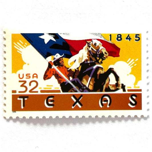 Image of a Texas Statehood postage stamp from 1995, featuring a cowboy on horseback waving the Texas State flag on vintage unused 32-cent USPS postage, Scott 2968.