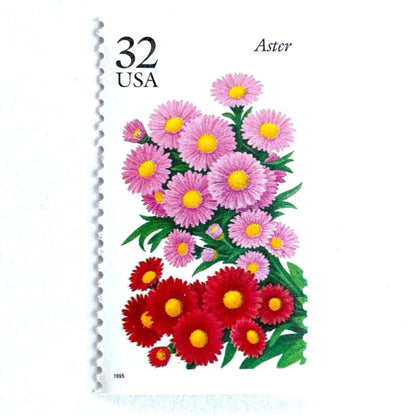 Image of 1995 Garden Flowers series “The Fall Garden: Aster” unused 32-cent vintage USPS mail stamps. Scott #2993. Stamp Themes: Flowers, Floral, Botanical, Fragrant, Gardening, Fall, Autumn, Nature. Pink, Red, Green, Multicolored gummed postage stamp. Perfect postage stamp to use for save the date announcements, wedding invitation postage, bridal shower invitations, birth announcements, thank you cards, valentine’s day, and snail mail.