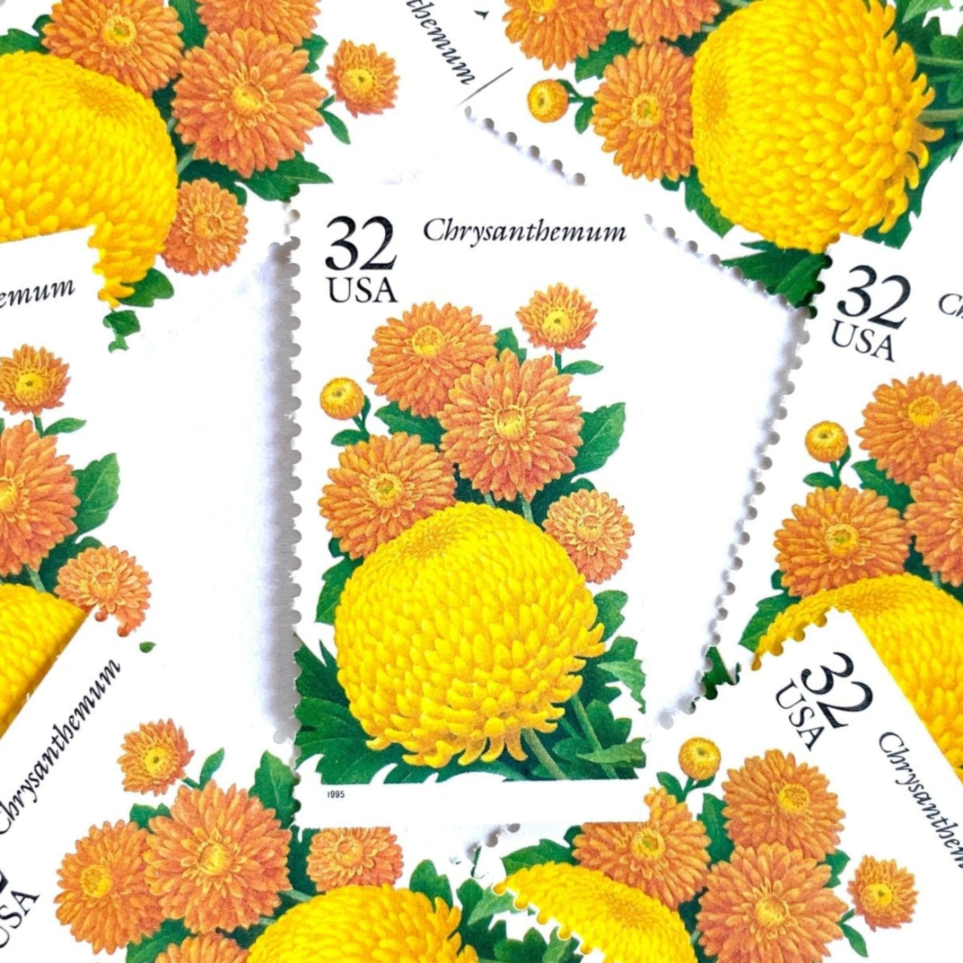 Image of 1994 Garden Flowers series “The Fall Garden: Chrysanthemum” unused 32-cent vintage USPS mail stamps. Scott #2994. Stamp Themes: Flowers, Floral, Botanical, Fragrant, Gardening, Fall, Autumn, Nature. Yellow, Orange Green, Multicolored gummed postage stamp. Perfect postage stamp to use for save the date announcements, wedding invitation postage, bridal shower invitations, birth announcements, thank you cards, valentine’s day, and snail mail.