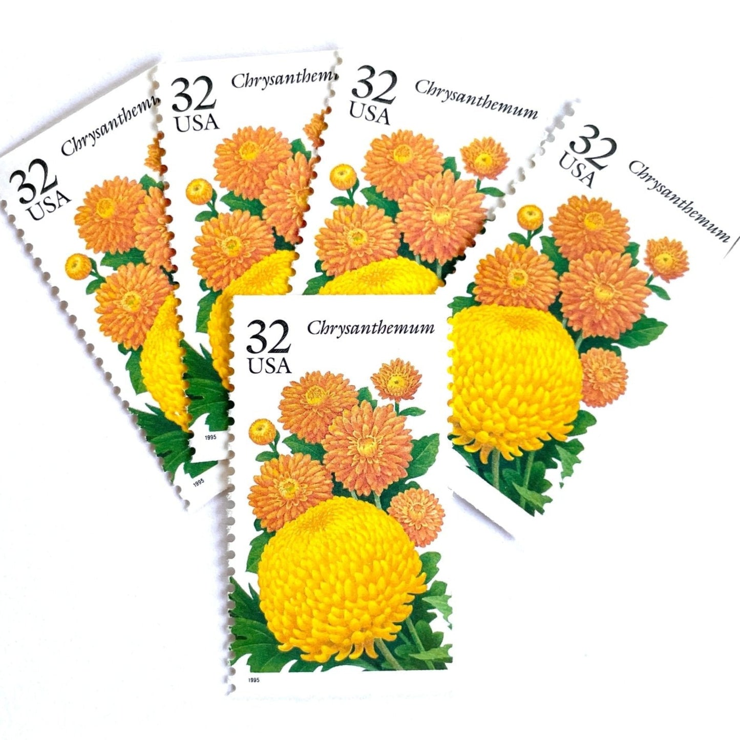 Image of 1994 Garden Flowers series “The Fall Garden: Chrysanthemum” unused 32-cent vintage USPS mail stamps. Scott #2994. Stamp Themes: Flowers, Floral, Botanical, Fragrant, Gardening, Fall, Autumn, Nature. Yellow, Orange Green, Multicolored gummed postage stamp. Perfect postage stamp to use for save the date announcements, wedding invitation postage, bridal shower invitations, birth announcements, thank you cards, valentine’s day, and snail mail.