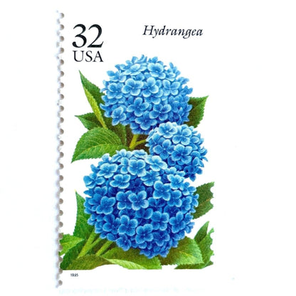 Image of 1995 Garden Flowers series “The Fall Garden: Hydrangea” unused 32-cent vintage USPS mail stamps. Scott #2996. Stamp Themes: Flowers, Floral, Botanical, Fragrant. Blue, Light Blue, Green, Multicolored gummed postage stamp. Perfect postage stamp to use for save the date announcements, wedding invitation postage, bridal shower invitations, birth announcements, thank you cards, valentine’s day, and snail mail.