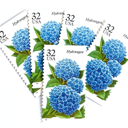 Image of 1995 The Seasonal Garden Series Fall Garden Flowers “Hydrangea” 32-cent vintage unused USPS mail stamps. Scott #2996. Stamp Themes: Flower, Floral, Botanical, Gardening, Nature, Seasons, Fall, Fall Garden Flowers. Blue, Light Blue, Green, Multicolored postage stamp. Perfect vintage postage stamp to use for save the date announcements, wedding invitation postage, shower invitations, thank you cards, and snail mail.