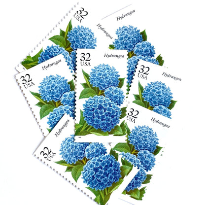 Image of 1995 The Seasonal Garden Series Fall Garden Flowers “Hydrangea” 32-cent vintage unused USPS mail stamps. Scott #2996. Stamp Themes: Flower, Floral, Botanical, Gardening, Nature, Seasons, Fall, Fall Garden Flowers. Blue, Light Blue, Green, Multicolored postage stamp. Perfect vintage postage stamp to use for save the date announcements, wedding invitation postage, shower invitations, thank you cards, and snail mail.