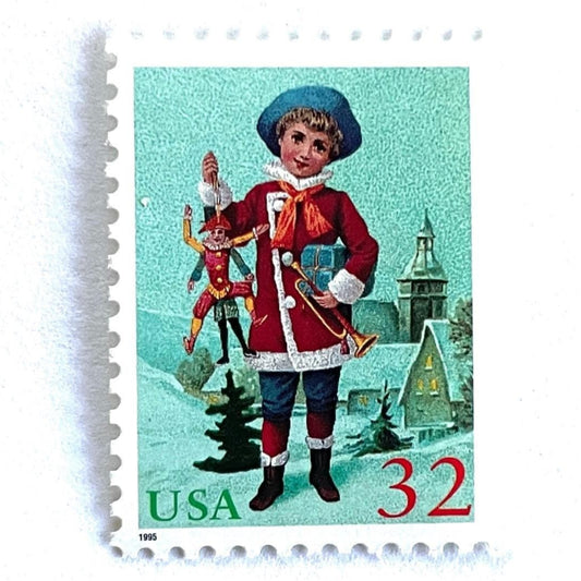 Image of 32-cent Contemporary Christmas 1995 Santa and Children “Child with Jumping Jack” USPS postage stamp featuring a young boy with blond, curly hair and a blue cap, dressed in a festive red coat with white fur trim, holding a traditional wooden jumping jack toy in one hand and a golden trumpet in the other. Scott #3005. Stamp themes: Christmas, holidays, winter, Santa Claus, toys, gifts, winter wedding, winter save-the-date. Green and red postage stamp.
