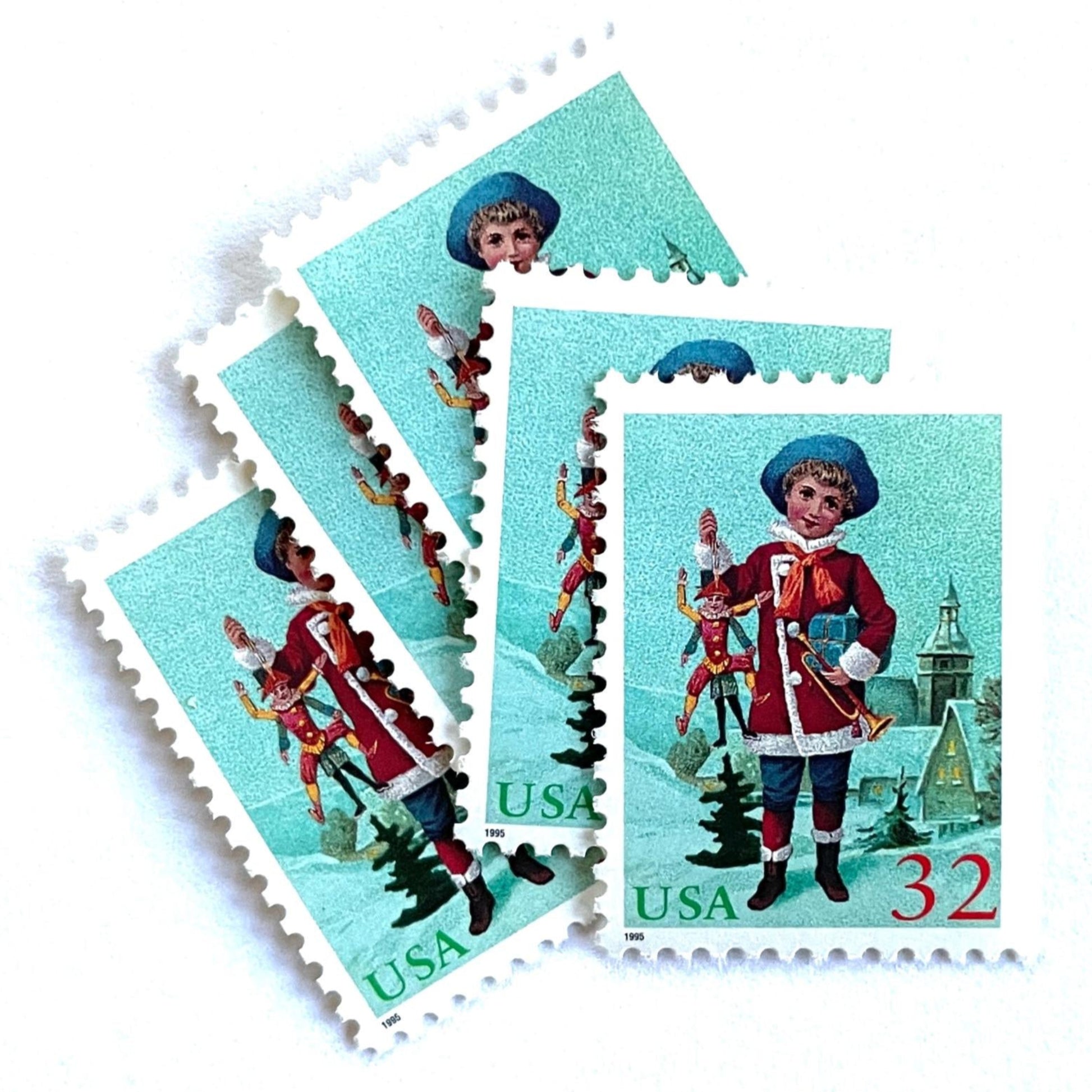 Image of 32-cent Contemporary Christmas 1995 Santa and Children “Child with Jumping Jack” USPS postage stamps featuring a young boy with blond, curly hair and a blue cap, dressed in a festive red coat with white fur trim, holding a traditional wooden jumping jack toy in one hand and a golden trumpet in the other. Scott #3005. Stamp themes: Christmas, holidays, winter, Santa Claus, toys, gifts, winter wedding, winter save-the-date. Green and red postage stamp.