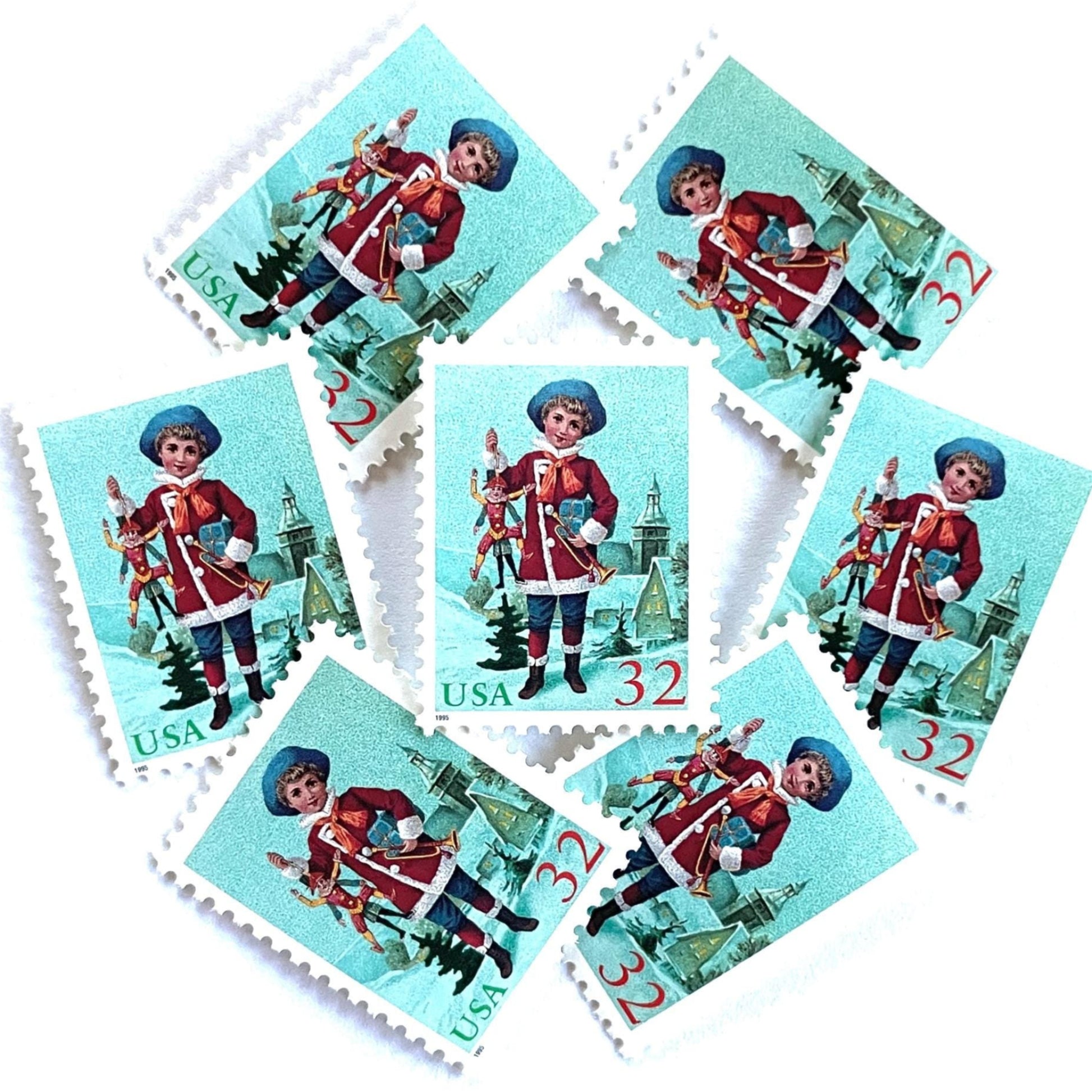 Image of 32-cent Contemporary Christmas 1995 Santa and Children “Child with Jumping Jack” USPS postage stamps featuring a young boy with blond, curly hair and a blue cap, dressed in a festive red coat with white fur trim, holding a traditional wooden jumping jack toy in one hand and a golden trumpet in the other. Scott #3005. Stamp themes: Christmas, holidays, winter, Santa Claus, toys, gifts, winter wedding, winter save-the-date. Green and red postage stamp.