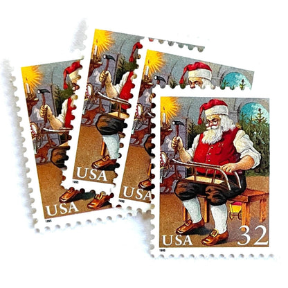 Image of 32-cent Contemporary Christmas 1995 Santa and Children “Santa Building a Sled” USPS postage stamps featuring a classic illustration of Santa Claus at work in his workshop, depicted sitting on a wooden bench, wearing his traditional red suit and hat, with a long white beard and spectacles, building a toy sled. Scott #3007. Stamp themes: Christmas, holidays, winter, toys, gifts, winter wedding, winter save-the-date. Red postage stamp.