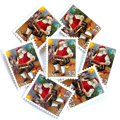 Image of 32-cent Contemporary Christmas 1995 Santa and Children “Santa Building a Sled” USPS postage stamps featuring a classic illustration of Santa Claus at work in his workshop, depicted sitting on a wooden bench, wearing his traditional red suit and hat, with a long white beard and spectacles, building a toy sled. Scott #3007. Stamp themes: Christmas, holidays, winter, toys, gifts, winter wedding, winter save-the-date. Red postage stamp.