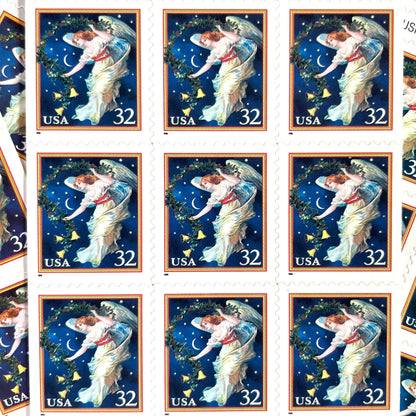 Image of 1995 Christmas “Midnight Angel” 32-cent stamps. Scott #3012. Stamp Themes: Christmas, Holidays, Angel, Celestial, Heavens, Bells, Night Sky, Victorian Christmas. Blue postage stamp.