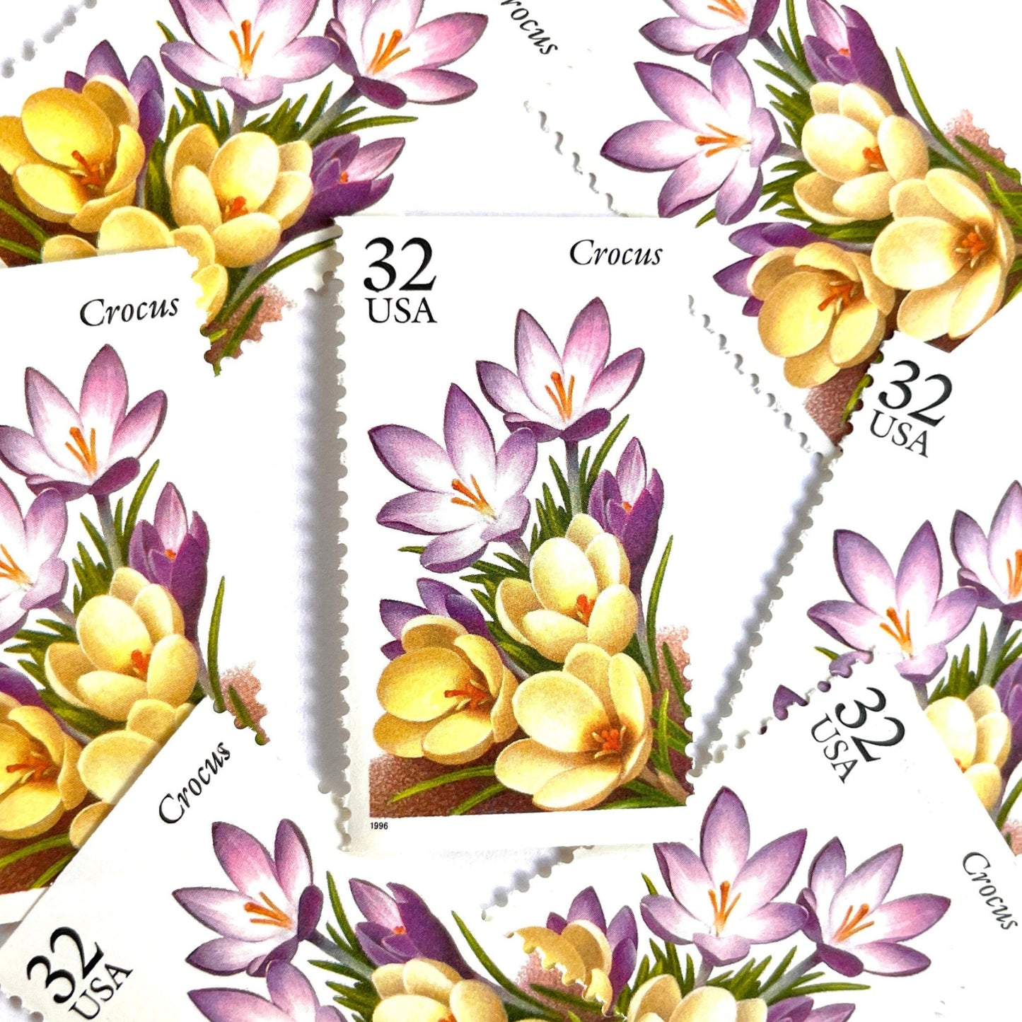 Image of vintage unused USPS Crocus postage stamps from the 1996 Winter Garden Flowers series, featuring a purple crocus flower with green foliage, 32-cent face value, Scott 3025.