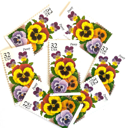 1996 32c Winter Garden Flowers Pansy USPS postage stamp, Scott 3027, featuring a purple and yellow pansy with green leaves from the Garden Flowers series.
