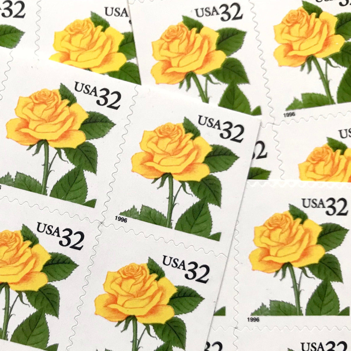 Vintage Yellow Rose postage stamps from the 1996 Flora & Fauna series featuring a bright yellow rose with green foliage on unused 32-cent USPS postage, Scott 3049.