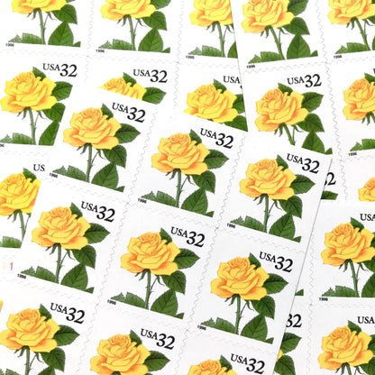 Vintage Yellow Rose postage stamps from the 1996 Flora & Fauna series featuring a bright yellow rose with green foliage on unused 32-cent USPS postage, Scott 3049.