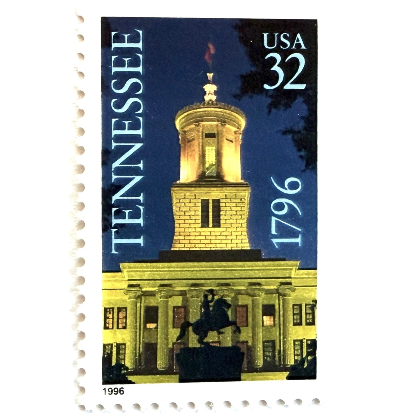 Image of Tennessee Statehood postage stamps from 1996, featuring the Tennessee State Capitol at night with an Andrew Jackson statue silhouette on vintage unused 32-cent USPS postage, Scott 3070.