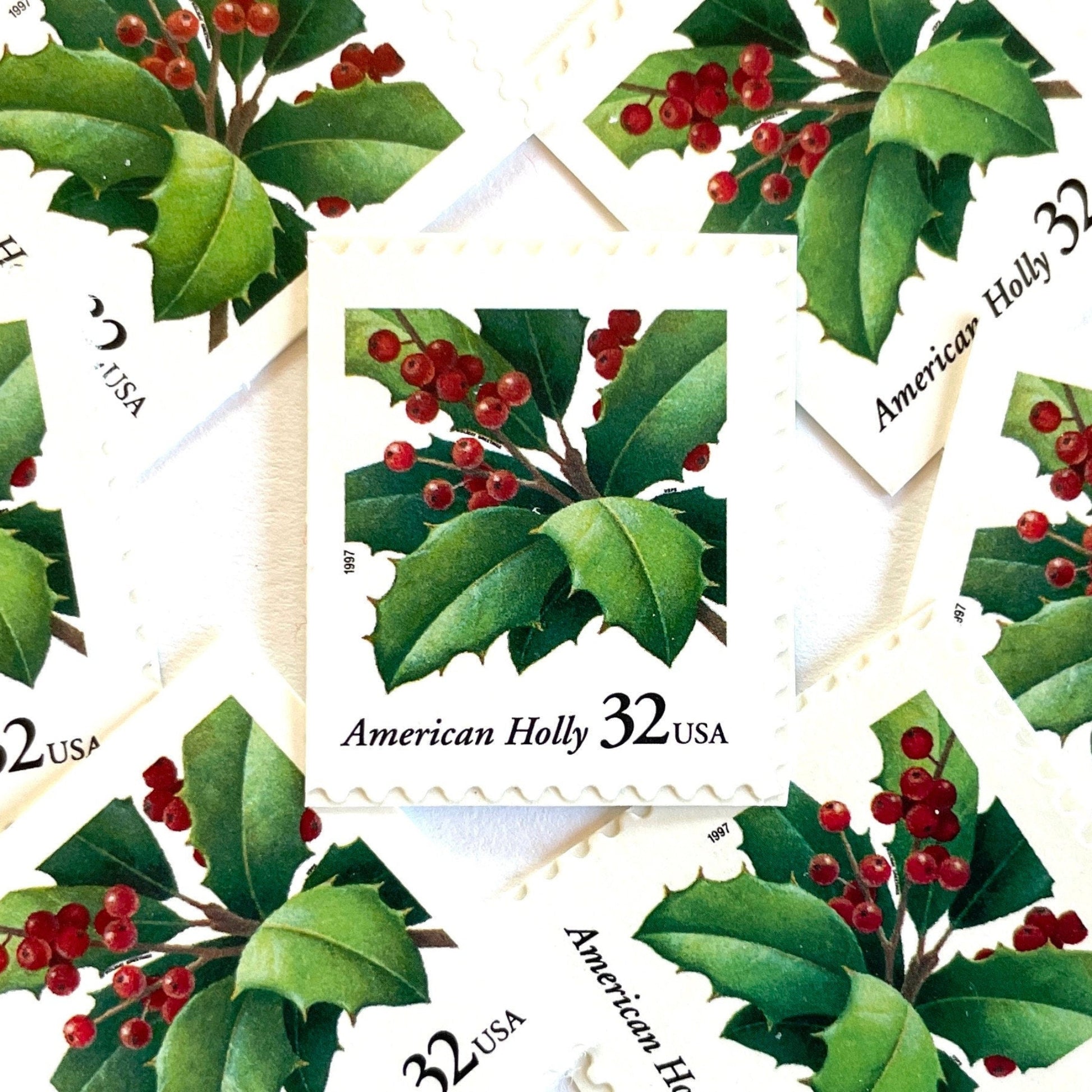 Image of 1997 Contemporary Christmas “American Holly” 32-cent stamps. Scott #3177. Stamp Themes: Holly, Red Berries, Christmas, Holidays, Winter, Evergreen. Green and red postage stamp.