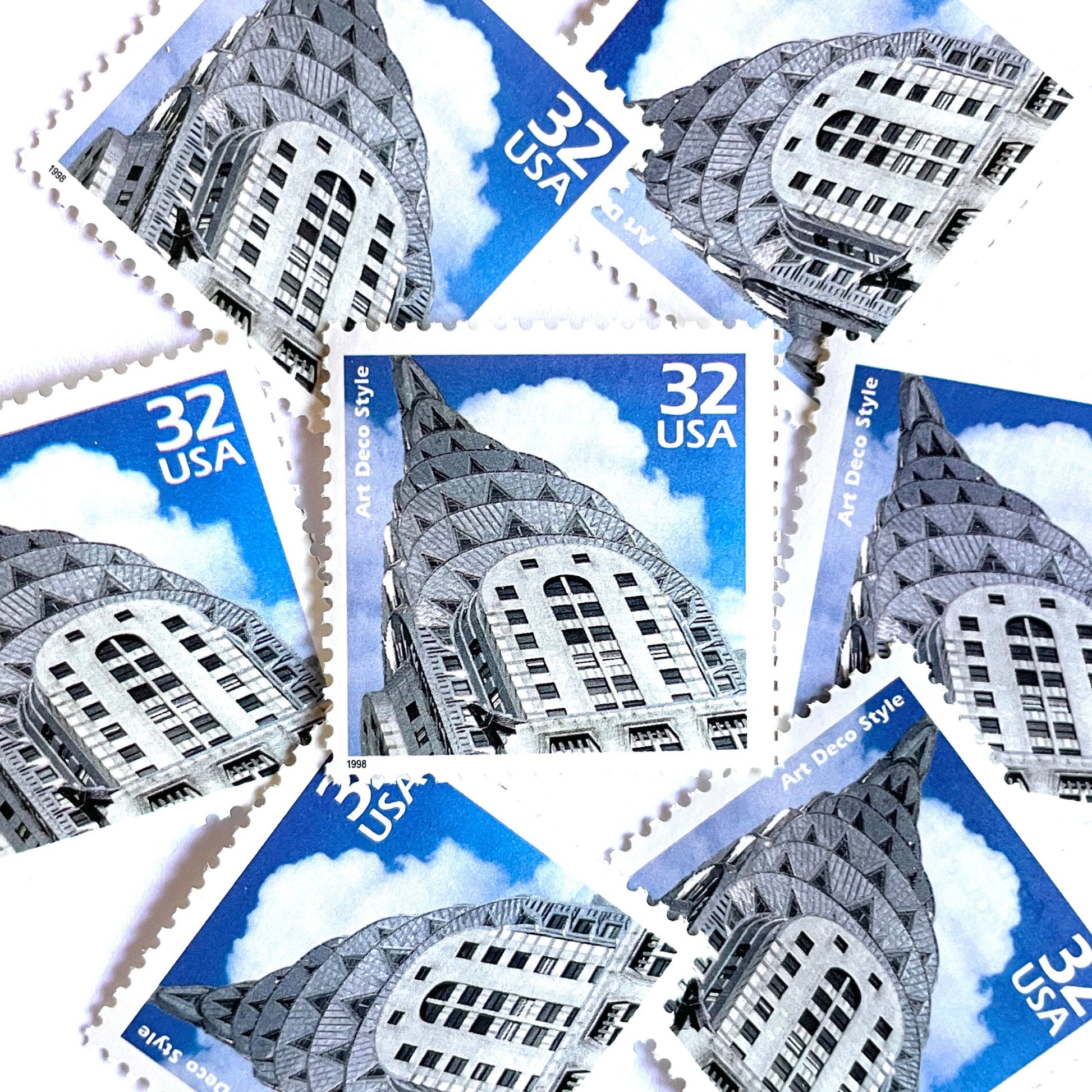 Image of 1998 Celebrate the Century - 1920s “Art Deco” 32-cent mail stamps. Scott #3184j. Stamp Themes: Art Deco Style, Chrysler Building, NYC, New York City. Blue and white postage stamp.
