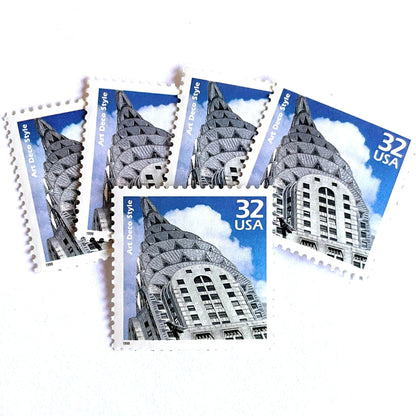Image of 1998 Celebrate the Century - 1920s “Art Deco” 32-cent mail stamps. Scott #3184j. Stamp Themes: Art Deco Style, Chrysler Building, NYC, New York City. Blue and white postage stamp.
