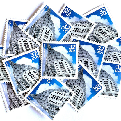 Image of 1998 Celebrate the Century - 1920s “Art Deco” 32-cent mail stamps. Scott #3184j. Stamp Themes: Art Deco Style, Chrysler Building, NYC, New York City. Blue and white postage stamp.