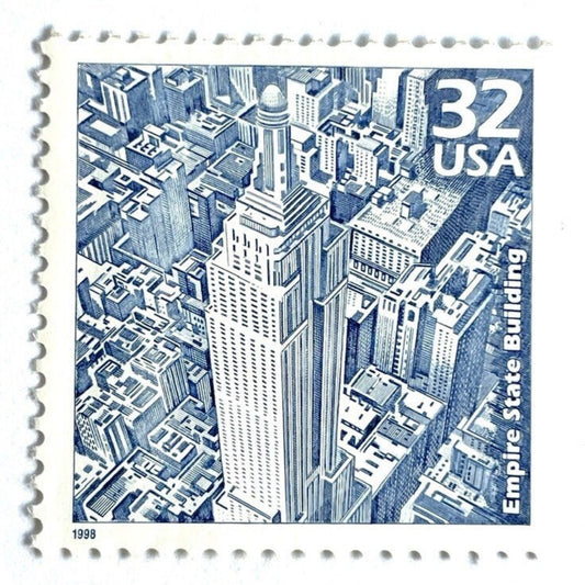 Empire State Building postage stamp from 1998 featuring Paul Calle’s pencil-sketch illustration of the iconic New York City skyscraper on vintage unused 32-cent USPS postage, Scott 3185b.