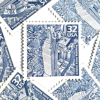 Empire State Building postage stamps from 1998 featuring Paul Calle’s pencil-sketch illustration of the iconic New York City skyscraper on vintage unused 32-cent USPS postage, Scott 3185b.