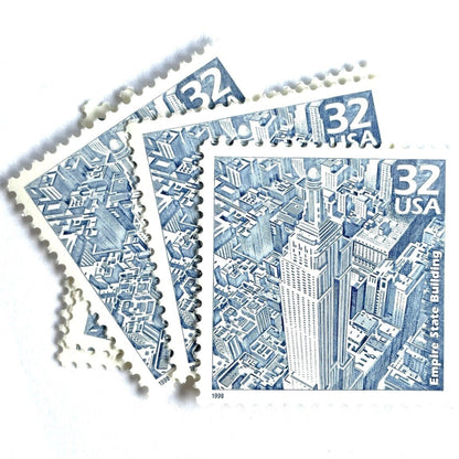 Empire State Building postage stamps from 1998 featuring Paul Calle’s pencil-sketch illustration of the iconic New York City skyscraper on vintage unused 32-cent USPS postage, Scott 3185b.