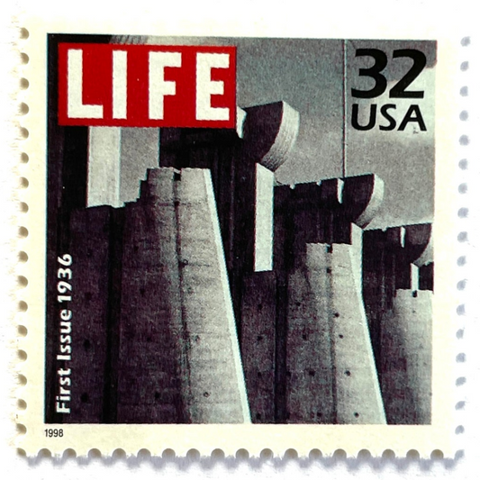 1st Issue LIFE Magazine postage stamp from 1998 featuring Margaret Bourke-White’s black-and-white photograph of Fort Peck Dam on the November 1936 debut cover of LIFE on vintage unused 32-cent USPS postage, Scott 3185c.
