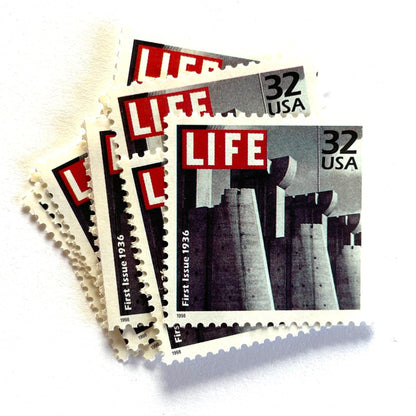 1st Issue LIFE Magazine postage stamps from 1998 featuring Margaret Bourke-White’s black-and-white photograph of Fort Peck Dam on the November 1936 debut cover of LIFE on vintage unused 32-cent USPS postage, Scott 3185c.