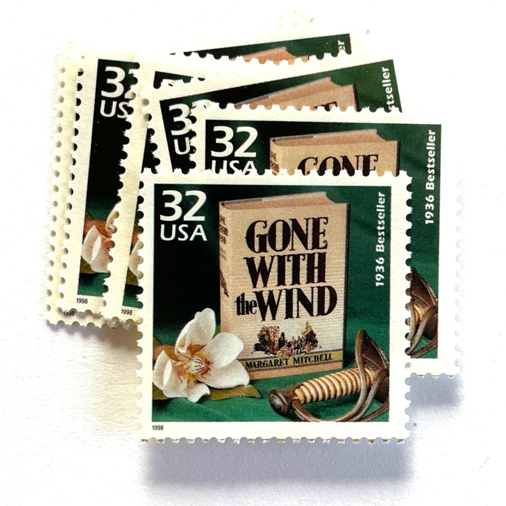 Image of 1998 Celebrate the Century — 1930s Gone With the Wind 32 cent stamps. Scott #3185i. Stamp themes: Classic Books, Novel, Literacy, Famous Movies, Cinema, Author Margaret Mitchell, Pulitzer Prize, Rhett Butler, Scarlet O'Hara, Southern Belle, Southern, Old South, Plantation, Civil War, Reconstruction, #1 Bestseller, Fiction, Love Story, Great American Classics, Burning of Atlanta, Magnolia, “Tomorrow is another day", "Frankly, my dear, I don't give a damn".
