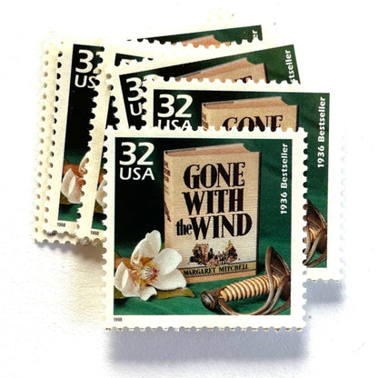 Image of 1998 Celebrate the Century — 1930s Gone With the Wind 32 cent stamps. Scott #3185i. Stamp themes: Classic Books, Novel, Literacy, Famous Movies, Cinema, Author Margaret Mitchell, Pulitzer Prize, Rhett Butler, Scarlet O'Hara, Southern Belle, Southern, Old South, Plantation, Civil War, Reconstruction, #1 Bestseller, Fiction, Love Story, Great American Classics, Burning of Atlanta, Magnolia, “Tomorrow is another day", "Frankly, my dear, I don't give a damn".