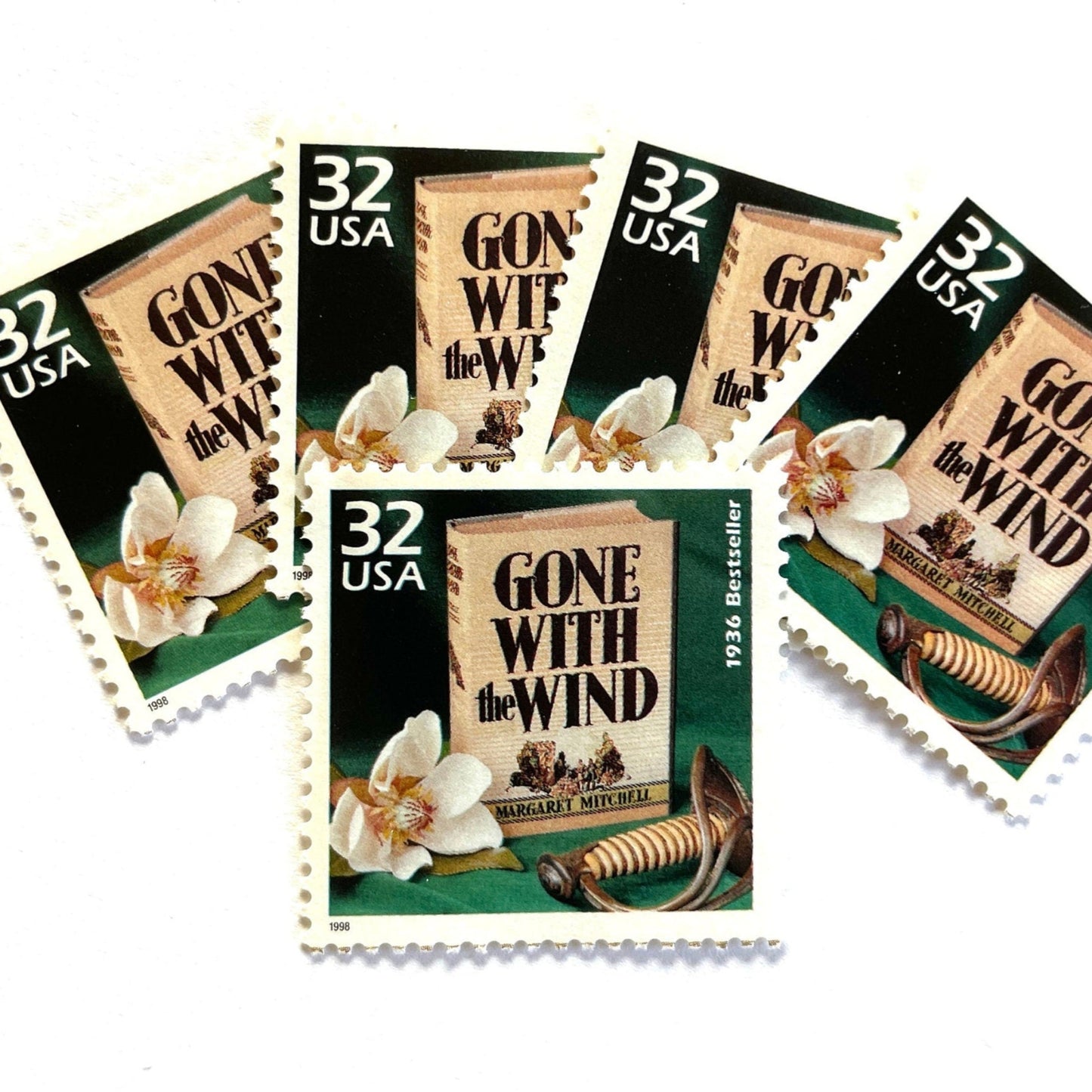 Image of 1998 Celebrate the Century — 1930s Gone With the Wind 32 cent stamps. Scott #3185i. Stamp themes: Classic Books, Novel, Literacy, Famous Movies, Cinema, Author Margaret Mitchell, Pulitzer Prize, Rhett Butler, Scarlet O'Hara, Southern Belle, Southern, Old South, Plantation, Civil War, Reconstruction, #1 Bestseller, Fiction, Love Story, Great American Classics, Burning of Atlanta, Magnolia, “Tomorrow is another day", "Frankly, my dear, I don't give a damn".