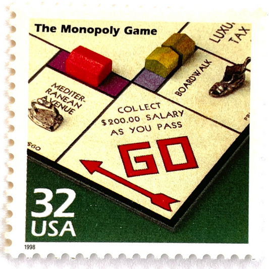 The Monopoly Game postage stamp from 1998 featuring Robert McClintock’s photograph of the classic Monopoly board on vintage unused 32-cent USPS postage, Scott 3185o.