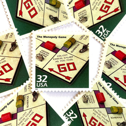 The Monopoly Game postage stamps from 1998 featuring Robert McClintock’s photograph of the classic Monopoly board on vintage unused 32-cent USPS postage, Scott 3185o.