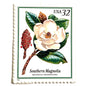 Southern Magnolia postage stamp from 1998 featuring large white magnolia blossoms and green foliage on vintage unused 32-cent USPS postage, Scott 3193.