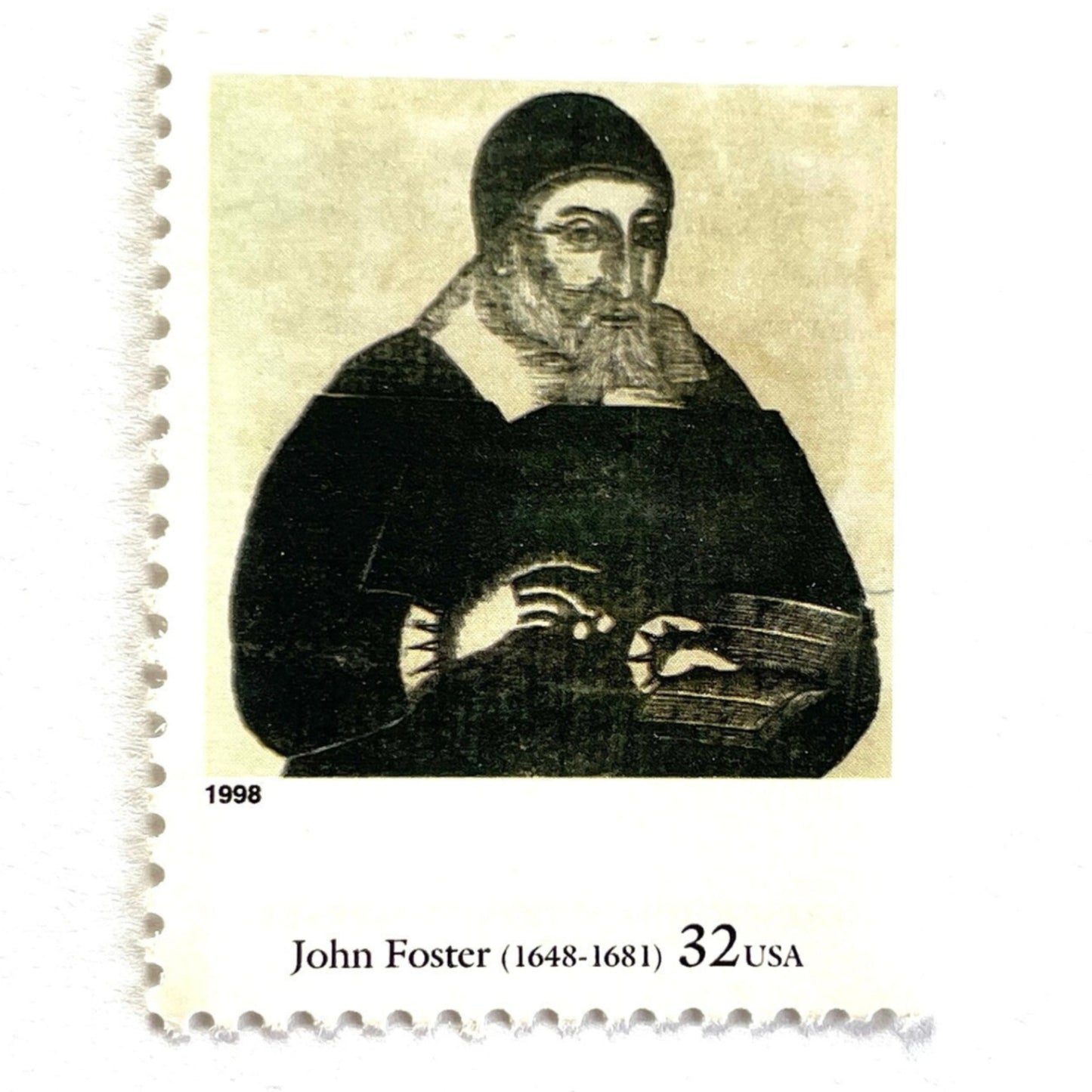 Close up image of John Foster’s “Portrait of Richard Mather” Postage Stamp from the 1998 Four Centuries of American Art Series. This stamp depicts the iconic engraving of a puritan minister. An iconic religious theme, this black and white postage stamp depicts a puritan minister and is often used to mail wedding invitations. These are vintage unused USPS postage stamps with a face value of 32 cents each. Scott number 3236A.
