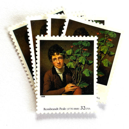 Rembrandt Peale’s "Rubens Peale with a Geranium" Postage Stamp from the 1998 Four Centuries of American Art Series. This stamp depicts a painting the artist’s brother, a botanist, holding a potted plant. An iconic horticultural or gardening theme, this predominately brown postage stamp is often used to mail wedding invitations. These are vintage unused USPS postage stamps with a face value of 32 cents each. Scott number 3236D.