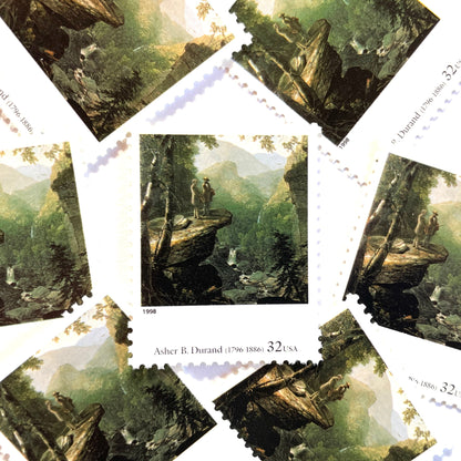 Asher B. Durand’s “Kindred Spirits” Postage Stamp from the 1998 Four Centuries of American Art Series. This stamp depicts two men talking while overlooking a vast western landscape with waterfalls in the background. An iconic nature theme, this predominately green postage stamp iconically depicts the American West. These are vintage unused USPS postage  stamps with a face value of 32 cents. Scott number 3236G.