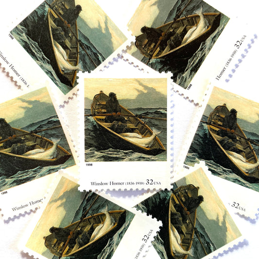 Winslow Homer’s "The Fog Warning" Postage Stamp from the 1998 Four Centuries of American Art Series. This stamp depicts a painting of a lone rowboat in choppy water, with fish on board, as the oarsman rows towards shore before the impending storm. An iconic nautical theme, this postage stamp is often used to mail wedding invitations. These are vintage unused USPS postage stamps with a face value of 32 cents each. Scott number 3236J.
